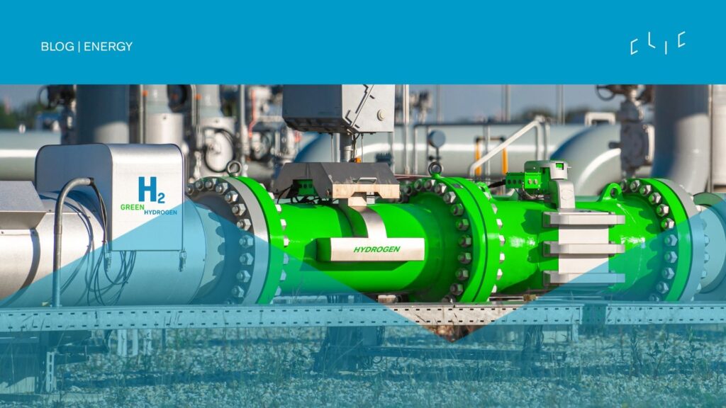 Green hydrogen pipeline and industrial infrastructure at a clean-energy facility, labelled "H2 Green Hydrogen".